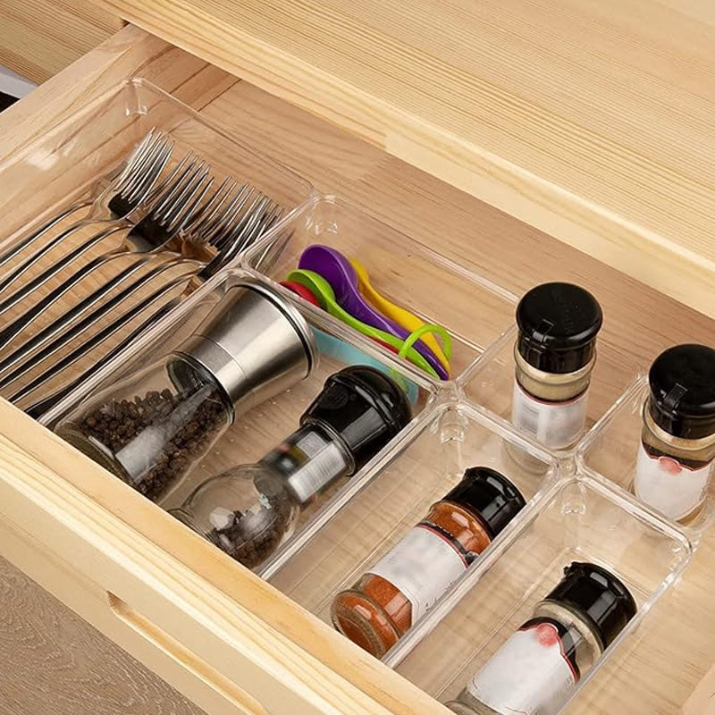 Set med genomskinliga lådor och organiseringsbrickor