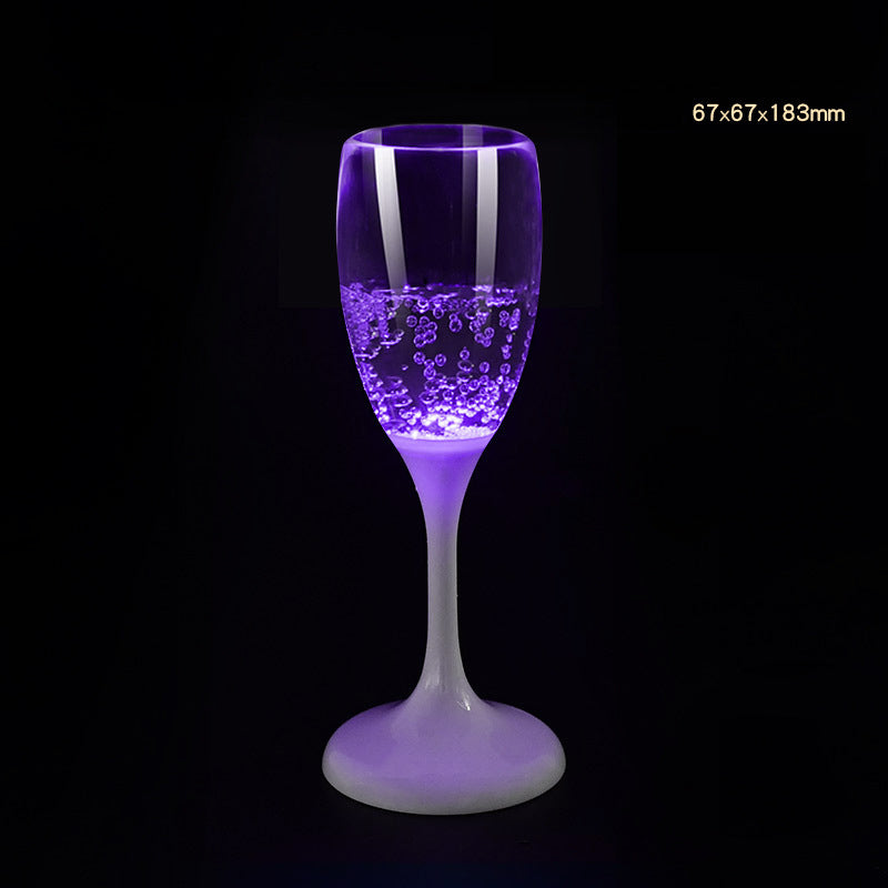 đ„I mörkret, ljusa champagneglas