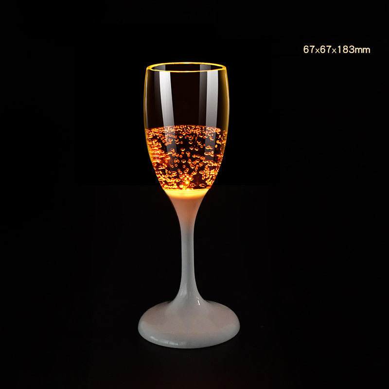đ„I mörkret, ljusa champagneglas