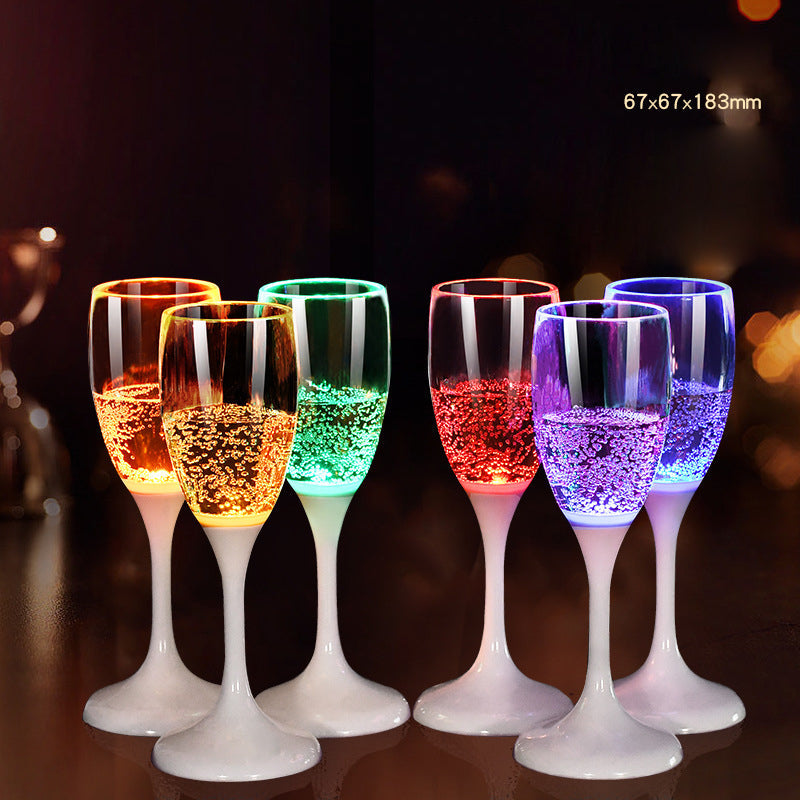 đ„I mörkret, ljusa champagneglas