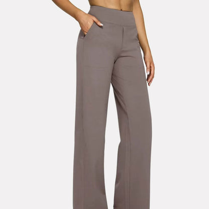 Högmidjade yogabyxor med fickor